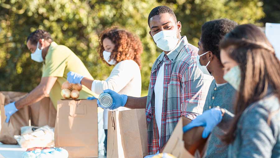 volunteers working at food drive