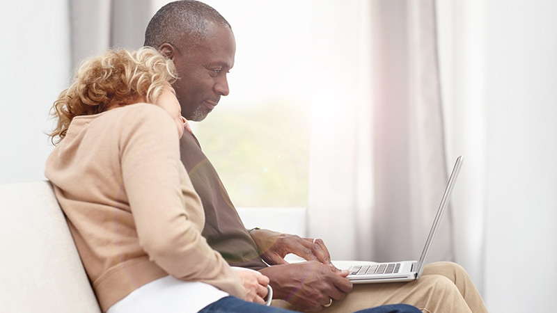 couple looking at laptop