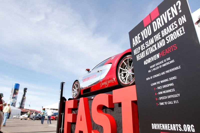 Craig Jackson’s Bugatti Veyron and Barrett-Jackson’s FAST signage. (Photo courtesy of Barrett-Jackson Auction Company)