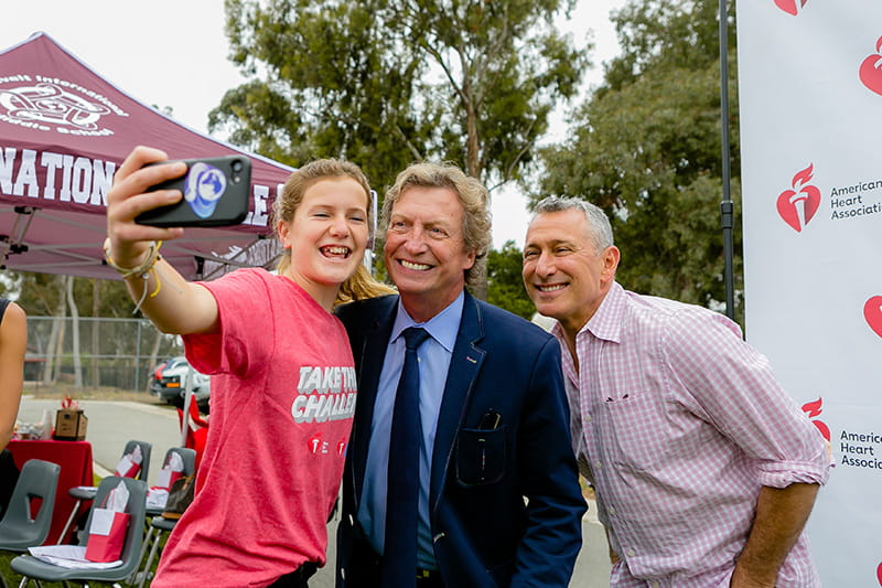 From left: Middle school student Charlotte Ferrier, Nigel Lythgoe and American Dance Movement co-founder Adam Shankman at the American Heart Challenge launch at Roosevelt Middle School in San Diego. (Photo by Sheri Tennison Berg for AHA)