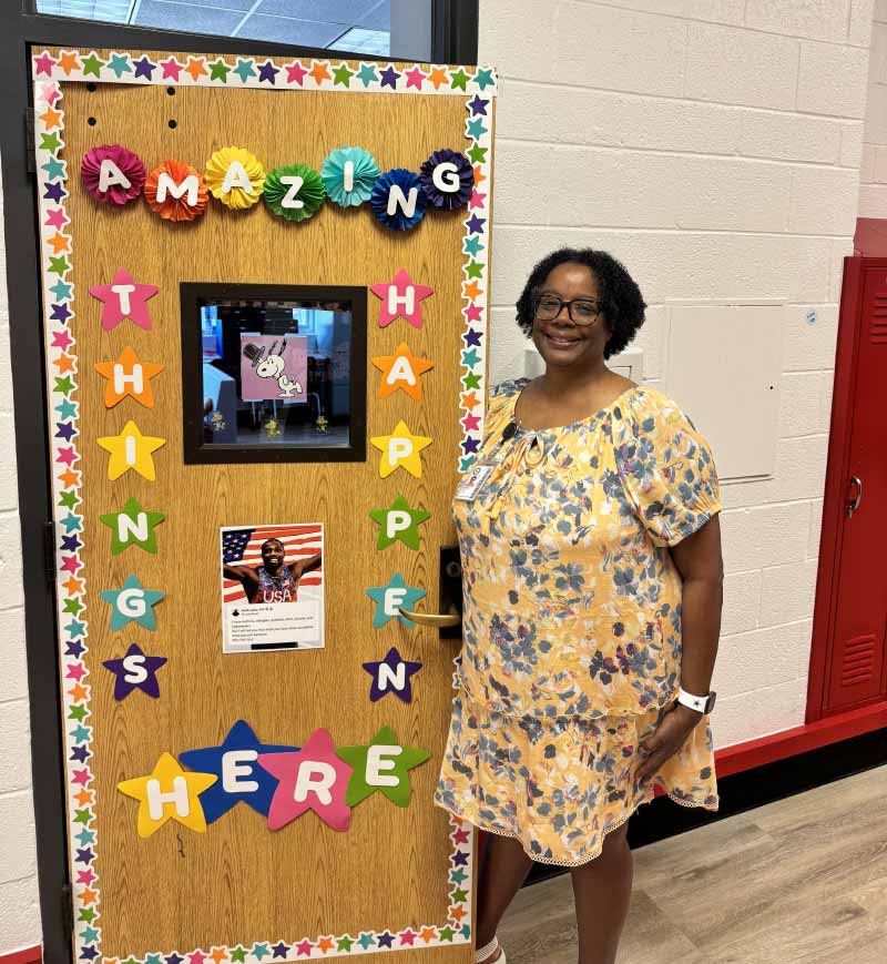 Sheridan Dixon stands at her classroom door at Hamilton Park Pacesetter Magnet in Dallas. (Photo courtesy of Jillian Miller)