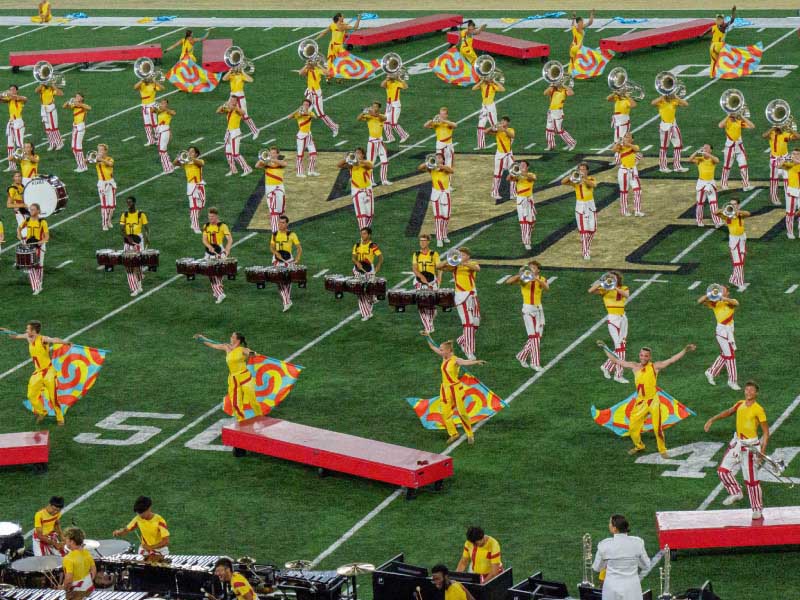 The Bluecoats, a marching ensemble from Canton, Ohio, performs in Winston-Salem, North Carolina, in July 2024. (Photo by Rogelio Aranda)