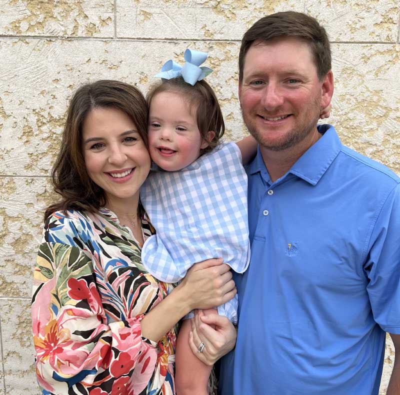 Rachel (left) and Blair Hamm with their daughter, Evelyn, who had heart surgery at 4 months old. (Photo courtesy of the Hamm family)