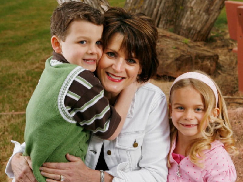 Cardiac arrest survivor Kathy Wilson-Gold (center) with her twins, Michael and Megan, when they were young children. (Photo courtesy of Kathy Wilson-Gold)