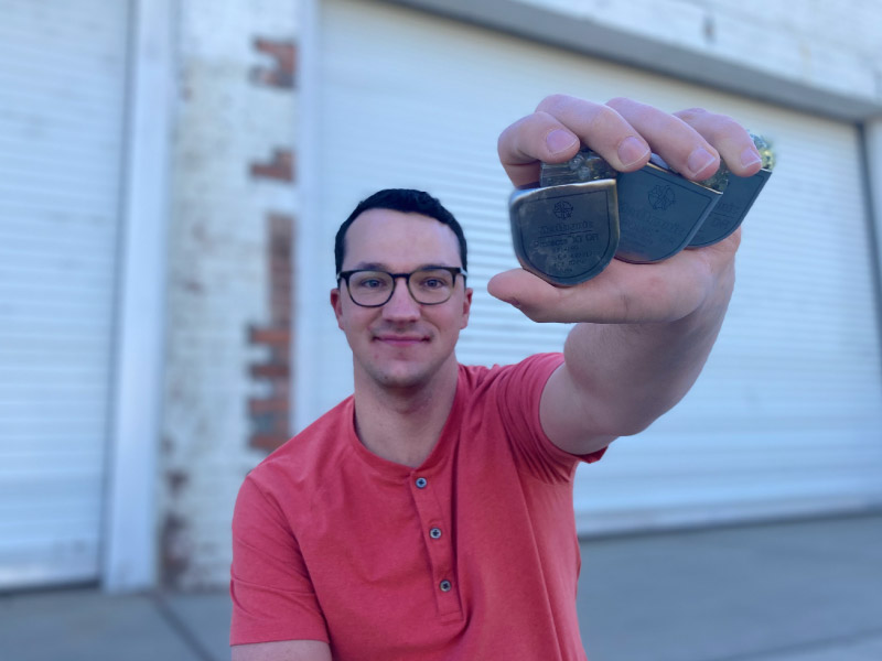 Hypertrophic cardiomyopathy survivor Jimmy Fremgen holds his first three implantable cardioverter defibrillators. (Photo courtesy of Jimmy Fremgen)