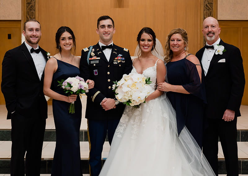 The Bartram family, from left: Son Nicholas, daughter Reba, son Vincent, daughter-in-law Giovanna, DeAnn and Greg. (Photo courtesy of DeAnn Bartram)