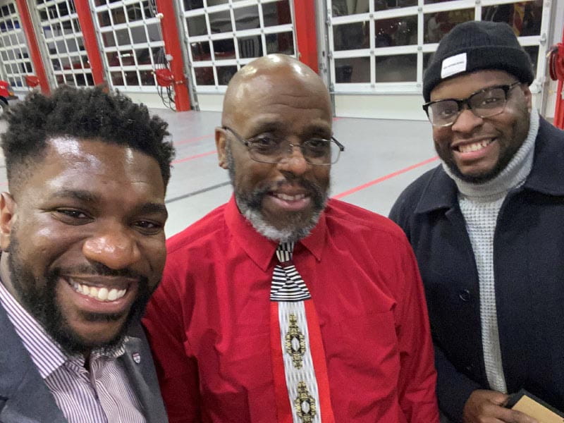 Chris Holton (center) collapsed on a trail during a walk and was saved by two cyclists, Bryan Buckley (left) and Isang Isang, with bystander CPR. (American Heart Association)