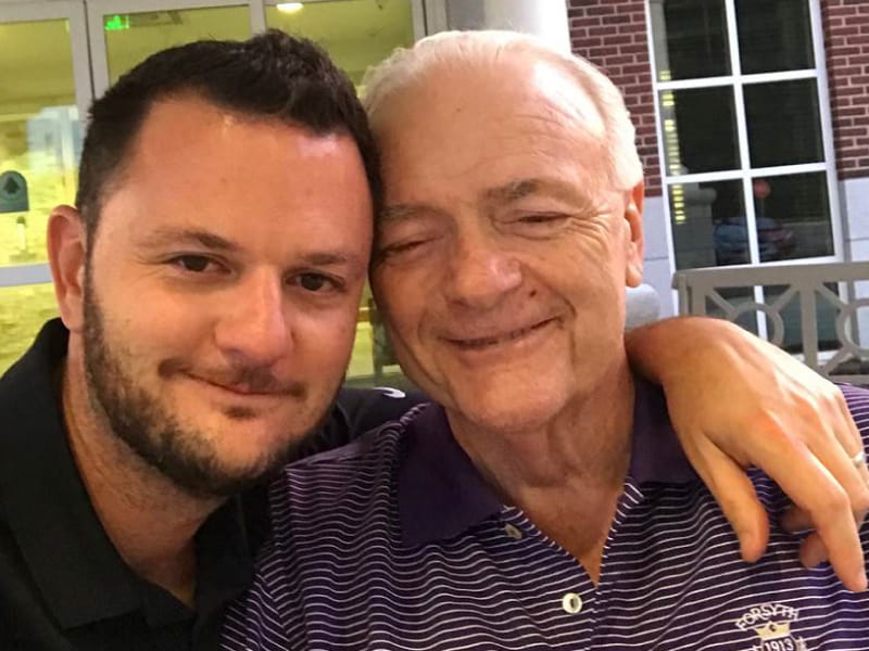 Bill Doss (right) was playing a round of golf when his heart stopped. He credits his son Will for being part of the life-saving efforts that day. (Photo courtesy of Will Doss)