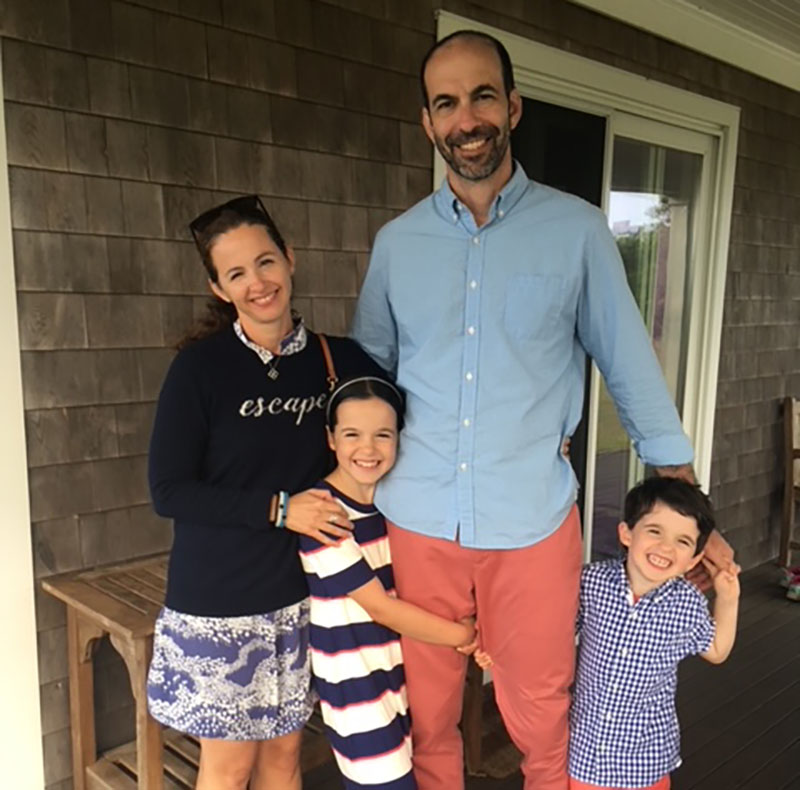 Lowell Chase (center) with his wife Emily (left) and their two children. (Photo courtesy of Lowell Chase)