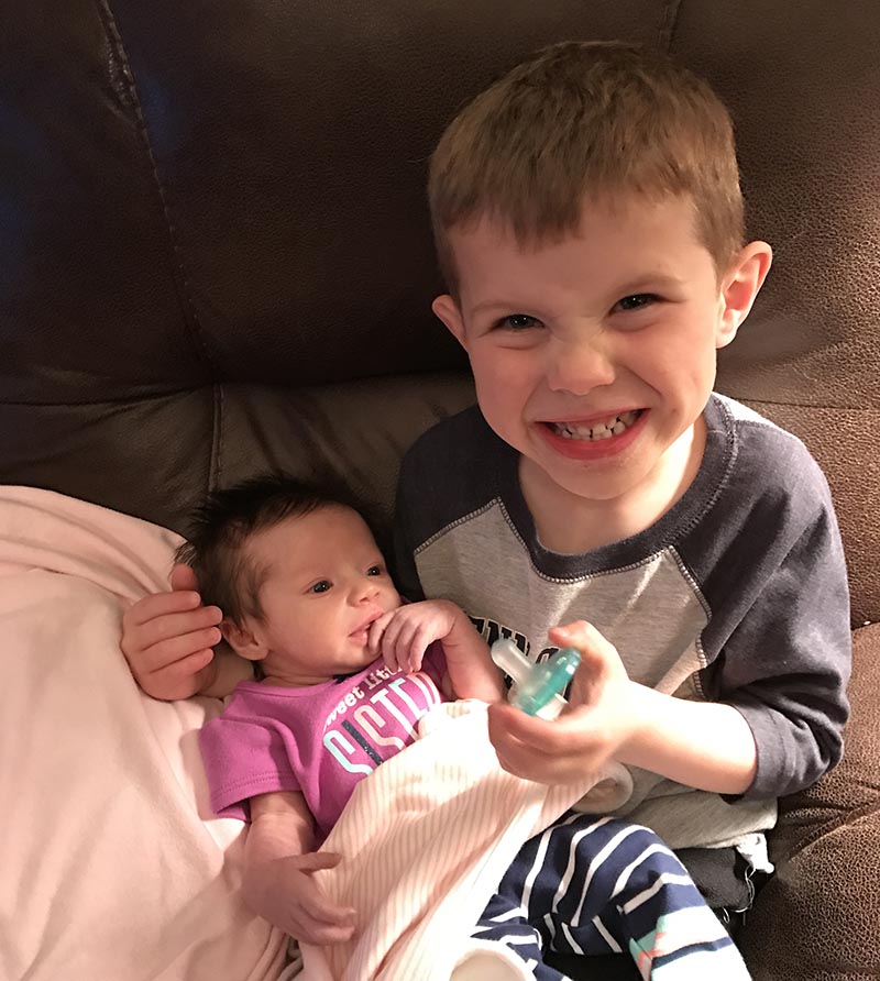 McCoy Tittsworth holds his baby sister, Molly, the day she came home from the hospital. (Photo courtesy of the Tittsworth family)