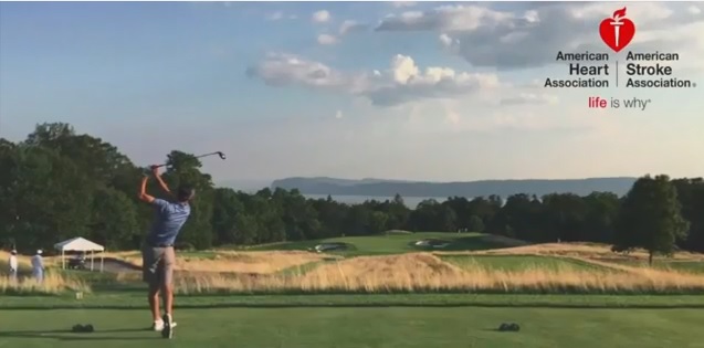 Stroke survivor Andrew Lask hitting golf shot.