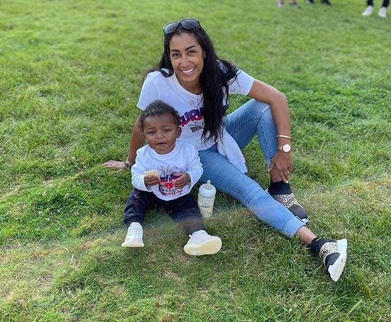 Amir Snell (left) with his mom, Samantha, who is active with the American Heart Association and cut the ribbon at a recent Heart Walk. (Photo courtesy of Samantha Snell)