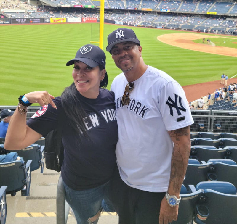 Cynthia Felix Jeffers (left) with her husband, Edwin, at a baseball game in 2022. (Photo courtesy of Cynthia Felix Jeffers)