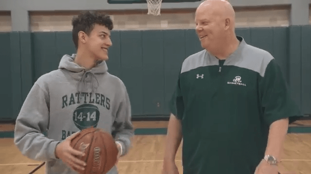 Kaeyel Moore with his basketball coach