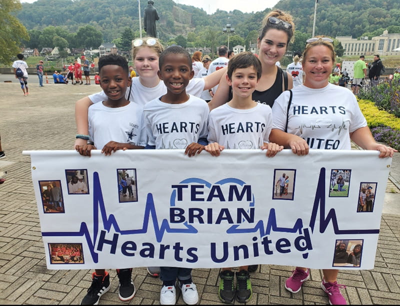 Jahari (far left front) with his classmates, friends and teachers at the Charleston Heart Walk. (Photo courtesy of LaKeisha Barron-Brown)