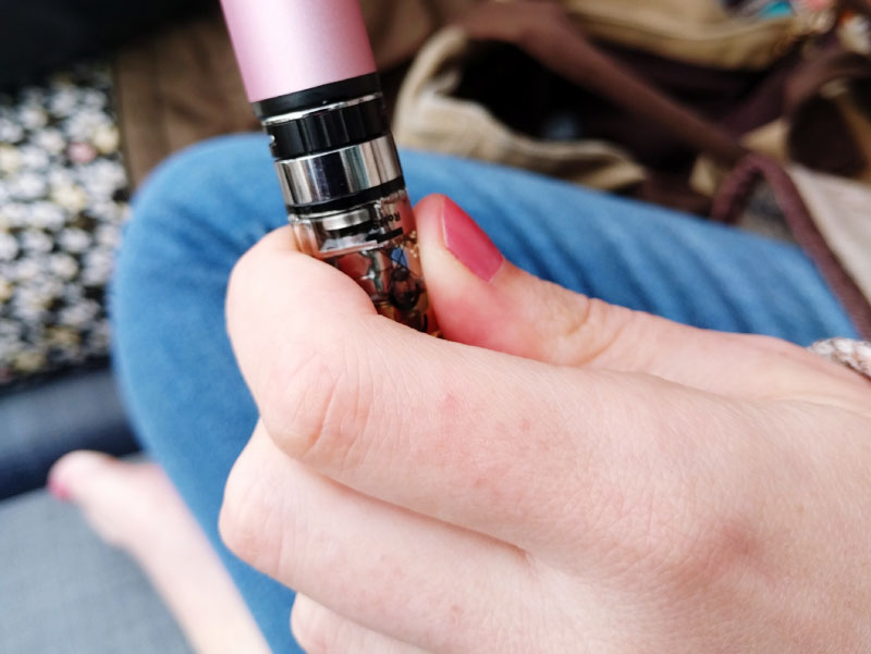 Hands using e-ecigarette