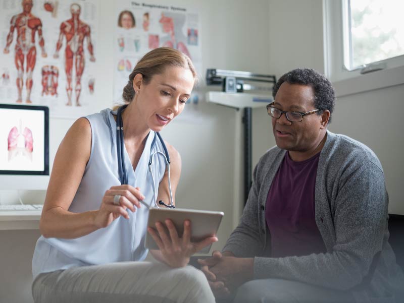 Doctor and African-American patient.