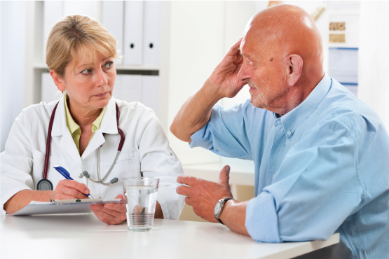 Doctor talking to older man