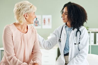 Doctor speaking with patient