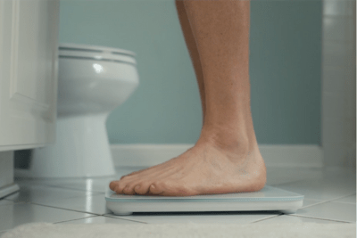 Feet on weight scale