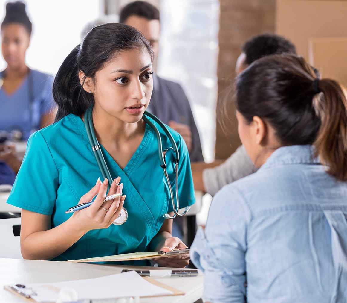 Doctor Conversing with patient 