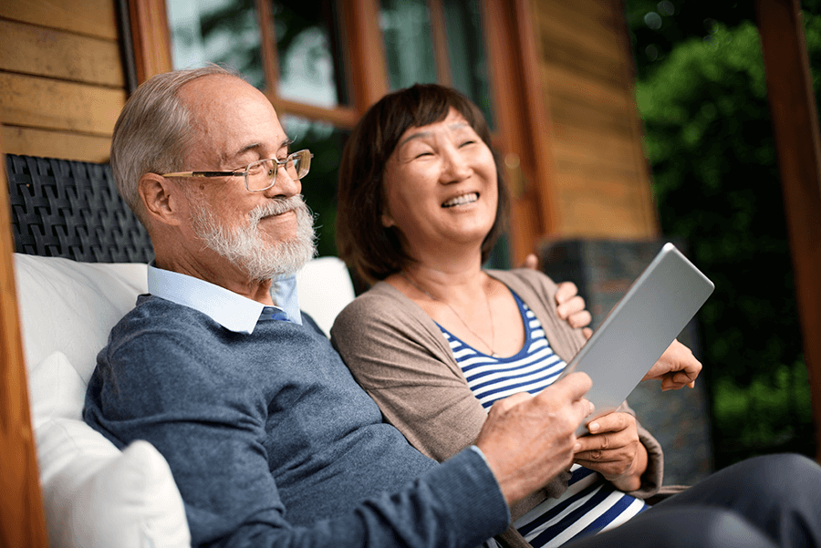 senior couple looking at a table