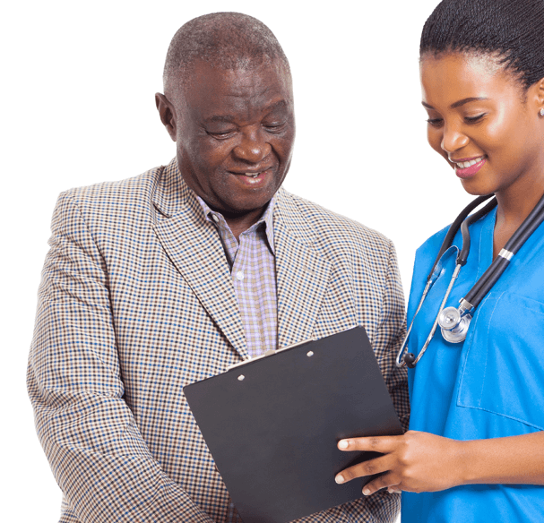 A Black female doctor is showing information on a clipboard to her Black male patient. They are smiling.